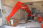 New_Holland_Kobelco_E215B_VVF.JPG